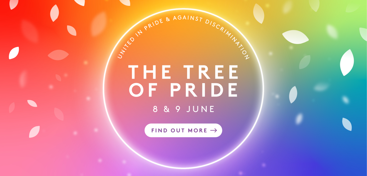 Tree of Pride white glowing text over rainbow background